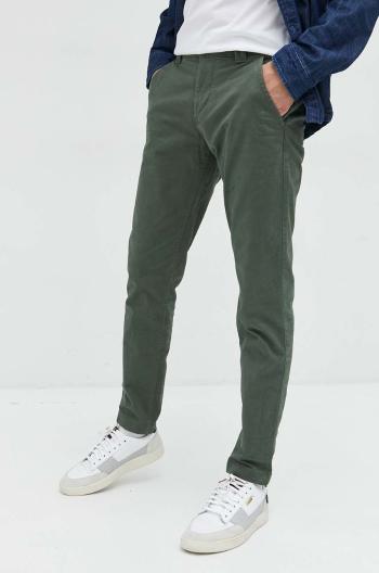 Kalhoty Tommy Jeans pánské, zelená barva, přiléhavé