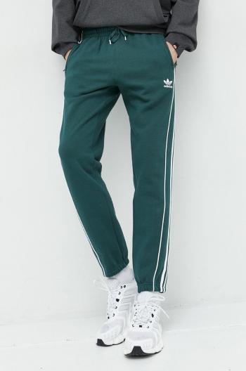 Bavlněné tepláky adidas Originals zelená barva, s aplikací