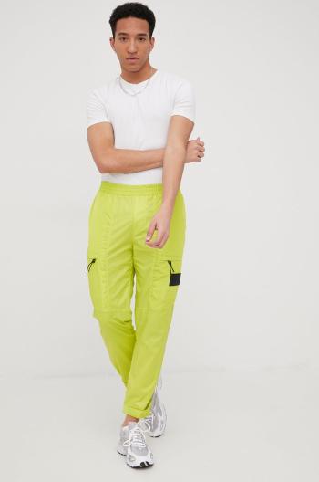 Tepláky Calvin Klein Jeans pánské, zelená barva