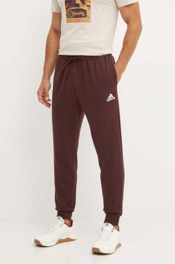 Tepláky adidas Essentials hnědá barva, s aplikací, IY9086