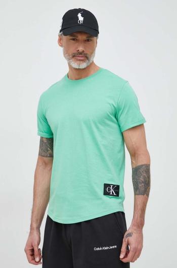Bavlněné tričko Calvin Klein Jeans tyrkysová barva, s aplikací
