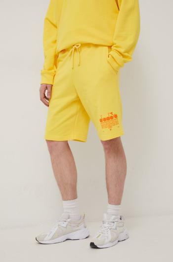 Bavlněné šortky Diadora pánské, žlutá barva