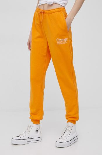 Kalhoty Only dámské, oranžová barva, s potiskem