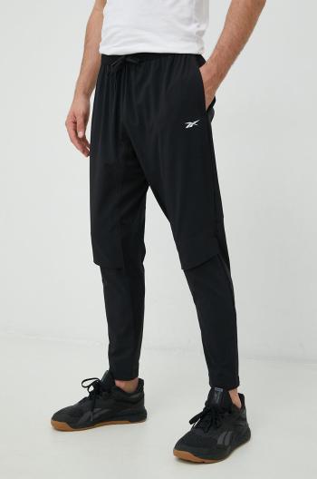Tréninkové kalhoty Reebok United By Fitness pánské, černá barva, hladké