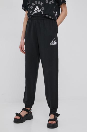 Bavlněné kalhoty adidas HC9176 dámské, černá barva, s potiskem