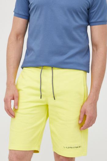 Bavlněné šortky Calvin Klein pánské, žlutá barva