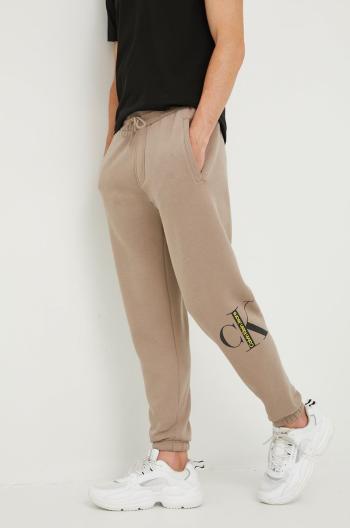 Tepláky Calvin Klein Jeans pánské, béžová barva, s potiskem
