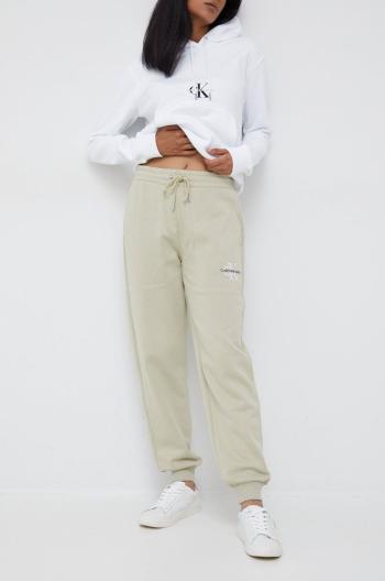 Tepláky Calvin Klein Jeans dámské, béžová barva, hladké