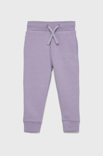 Dětské kalhoty Guess fialová barva, melanžové