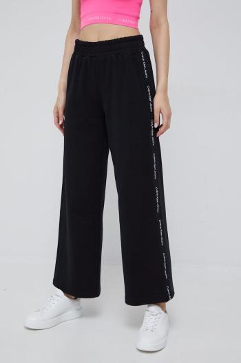 Tepláky Calvin Klein Jeans dámské, černá barva, s aplikací
