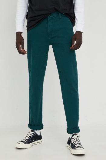 Kalhoty Levi's pánské, zelená barva, přiléhavé