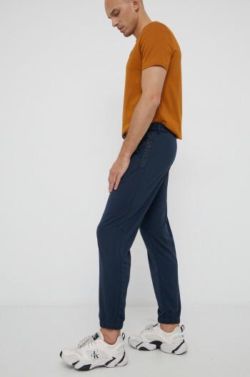 Kalhoty Calvin Klein pánské, tmavomodrá barva, s potiskem