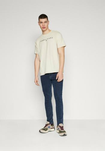 Tommy Jeans pánské béžové tričko LINEAR LOGO - XXL (ACG)