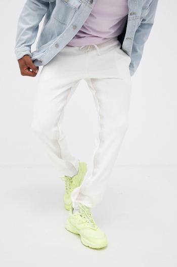 Kalhoty adidas Originals H11475 pánské, krémová barva, s aplikací