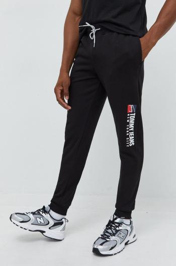 Tepláky Tommy Jeans pánské, černá barva, s potiskem