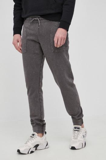 Bavlněné kalhoty Guess pánské, šedá barva, vzorované
