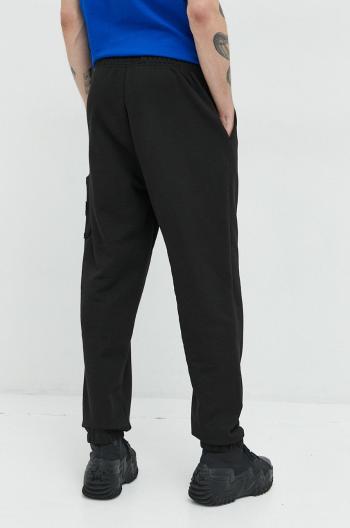 Bavlněné tepláky Tommy Jeans černá barva