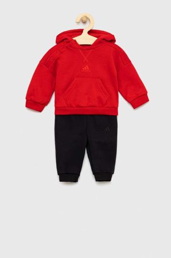 Dětská tepláková souprava adidas červená barva