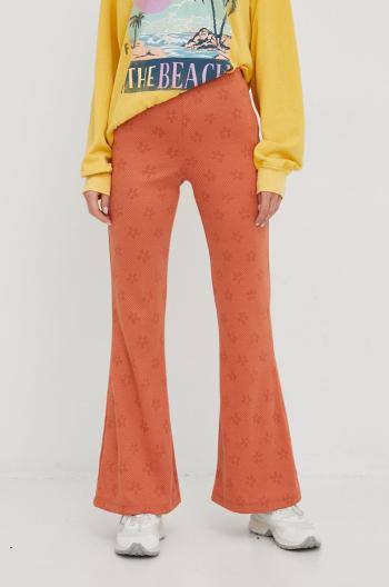 Kalhoty Billabong dámské, oranžová barva, zvony, medium waist