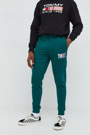 Bavlněné tepláky Tommy Jeans zelená barva, s potiskem