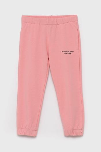 Dětské kalhoty Calvin Klein Jeans růžová barva, hladké