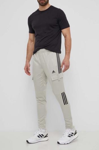 Tepláky adidas TIRO zelená barva, s aplikací, IS1544