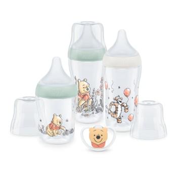 NUK Perfect Match Disney Medvídek Pú Anti-Colic startovací sada včetně dudlíku Space 0-6 měsíců v béžové a mátové barvě