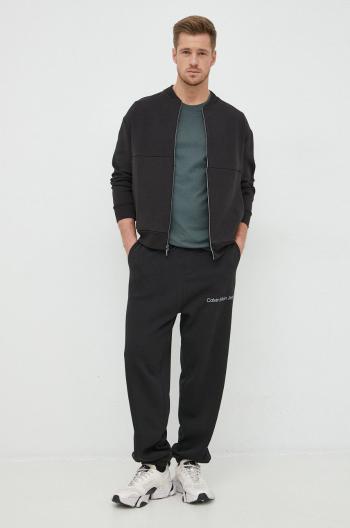 Tepláky Calvin Klein Jeans pánské, černá barva, s potiskem