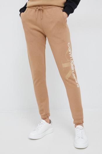Tepláky Calvin Klein Jeans dámské, béžová barva, hladké