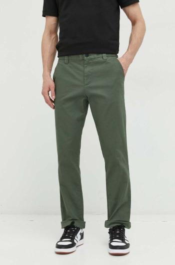 Kalhoty Tommy Jeans pánské, zelená barva, přiléhavé