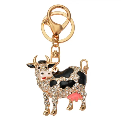 Zlatý kovový přívěšek na klíče s kamínky kráva - 5*2*5 cm JZKC0174