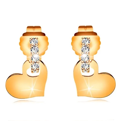 Náušnice ze žlutého 14K zlata - čirý zirkonový oblouk, lesklé ploché srdíčko