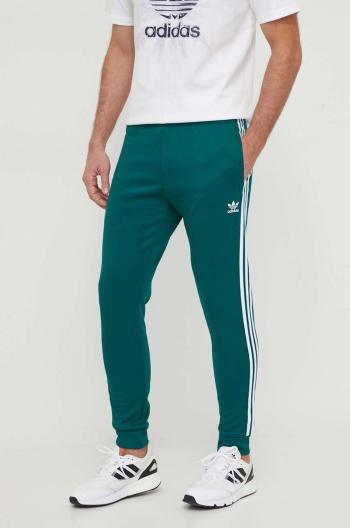 Tepláky adidas Originals zelená barva, s aplikací, IR9886