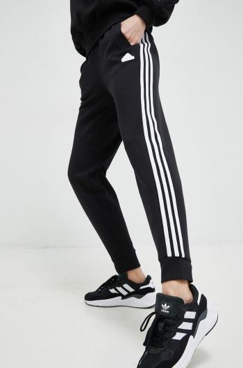 Tepláky adidas černá barva, s aplikací