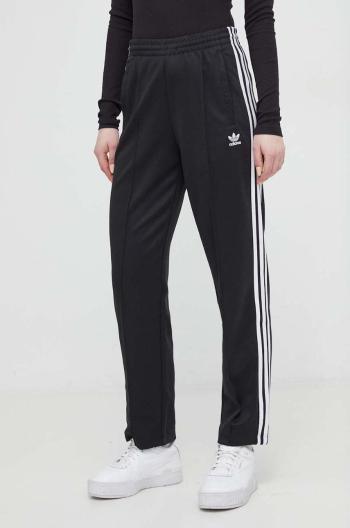 Tepláky adidas Originals černá barva, vzorované, IS4102