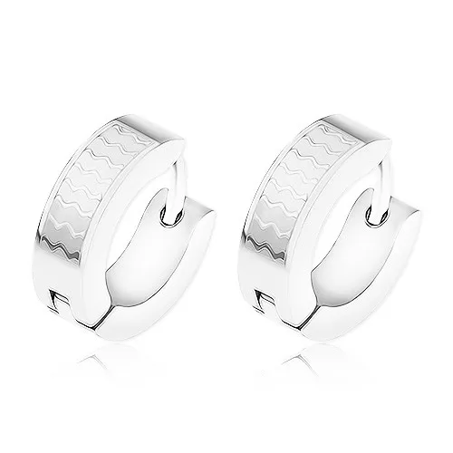 Ocelové náušnice, malé lesklé vlnky na matném pozadí