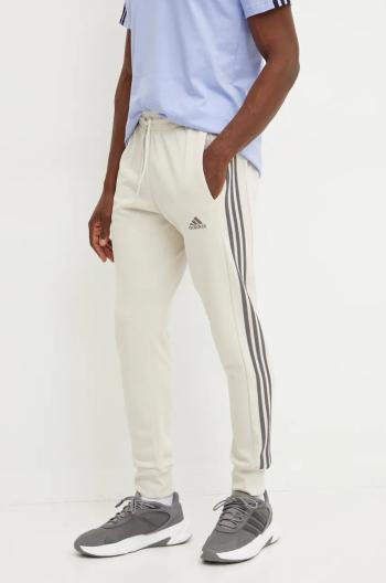 Bavlněné tepláky adidas Essentials béžová barva, IW7682