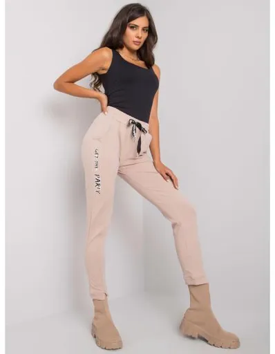 Dámské tepláky s nápisem PEYTON béžové