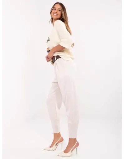 Světle béžové dámské tepláky s laclem