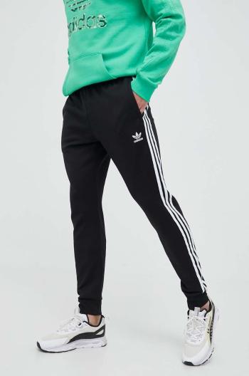 Bavlněné tepláky adidas Originals černá barva, s aplikací