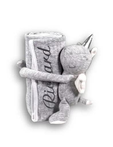 Jednorožec s dekou s výšivkou