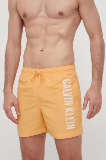 Plavkové šortky Calvin Klein oranžová barva, KM0KM01004