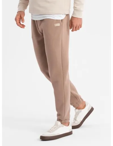 Pánské strukturované úpletové tepláky - hnědé V5 OM-PASK-0211