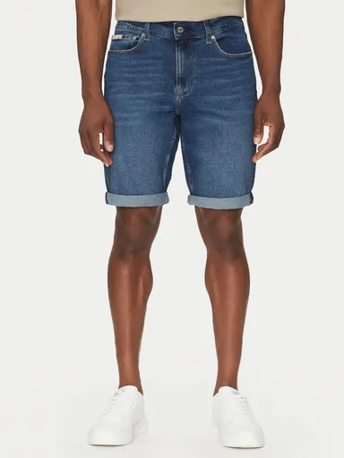 Calvin Klein pánské modré džínové šortky J30J327184 31/NI