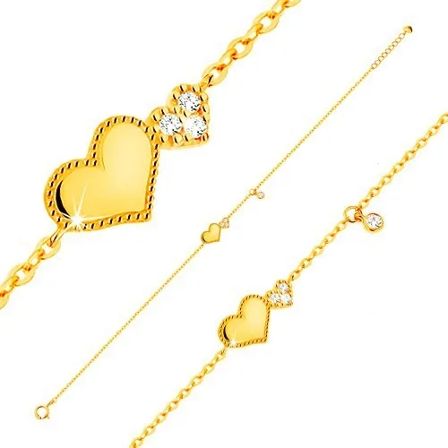 Náramek ze žlutého 14K zlata - lesklé a třpytivé srdíčko, visící čirý zirkonek
