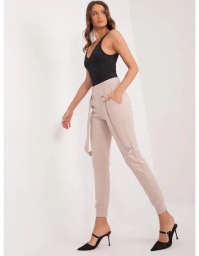 Dámské tepláky s kapsami béžové