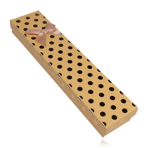 Podlouhá oranžová krabička na náramek s růžovou mašlí a tečkami