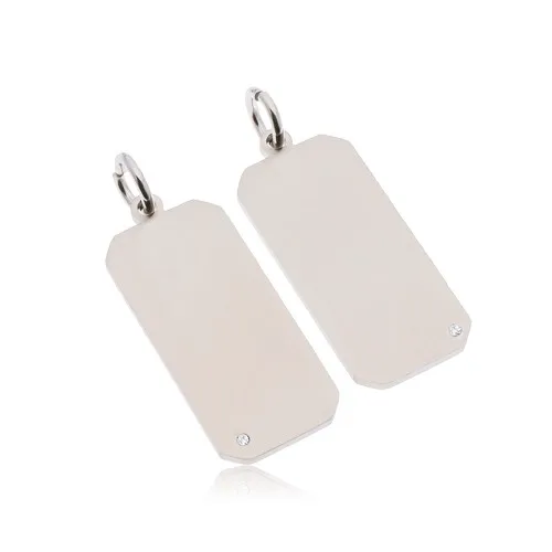 Dva ocelové přívěsky stříbrné barvy, matné obdélníky, čiré zirkony