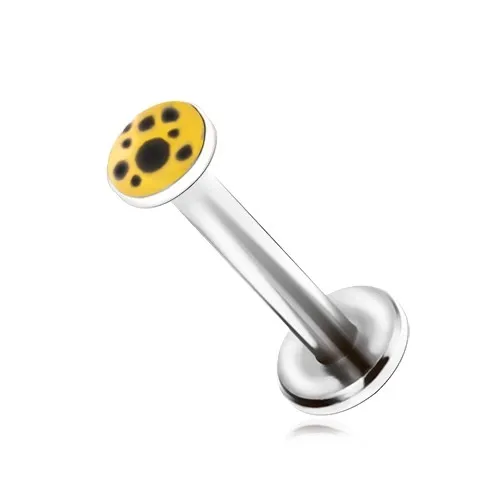 Piercing do brady z oceli, černé skvrny na žlutém podkladu