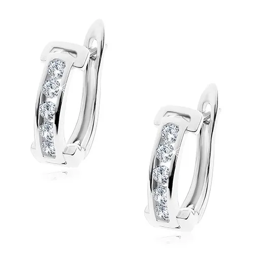 Náušnice stříbrné barvy, oblouk s linií čirých zirkonů